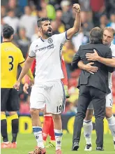  ??  ?? Chelsea’s Diego Costa salutes the fans after the final whistle.