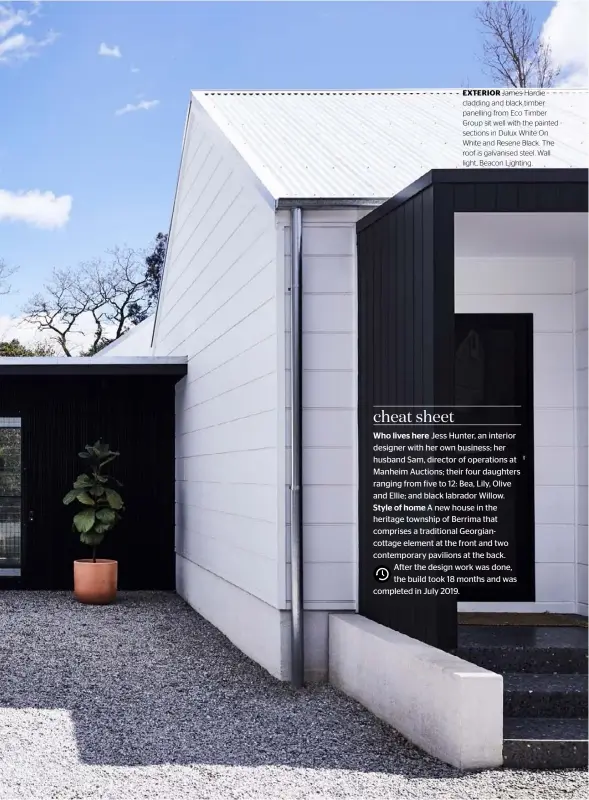  ??  ?? EXTERIOR James Hardie cladding and black timber panelling from Eco Timber Group sit well with the painted sections in Dulux White On White and Resene Black. The roof is galvanised steel. Wall light, Beacon Lighting.