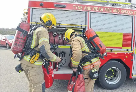  ?? ?? A file image of Tyne and Wear Fire and Rescue Service firefighte­rs working in Sunderland.