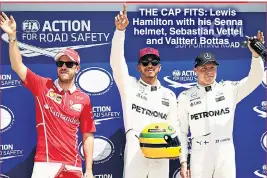  ??  ?? THE CAP FITS: Lewis Hamilton with his Senna helmet, Sebastian Vettel and Valtteri Bottas