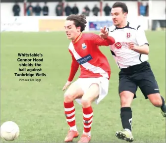  ?? Pictures: Les Biggs ?? Whitstable’s Connor Hood shields the ball against Tunbridge Wells