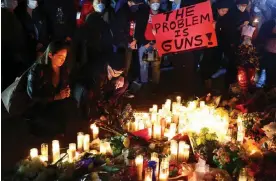  ?? Photograph: Mario Tama/Getty Images ?? A candleligh­t vigil on Wednesday for victims of the Monterey Park shooting.