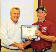  ?? Photograph submitted ?? Carl Landis, in cap, receiving Best Mechanic Award recently. Landis is from Pea Ridge.