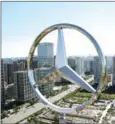  ?? GOU YIGE/AFP ?? The giant logo of German vehicle maker Daimler’s Mercedes-Benz sits on the top of its head office building in Beijing.