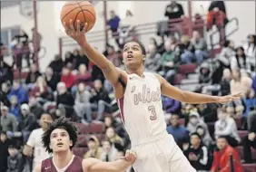  ?? Hans Pennink / Special to the Times Union ?? Watervliet’s J.J. Chestnut (3), who had 19 points and eight assists, scores past Noah Foster of Bishop Gibbons in their Class B opener on Tuesday.