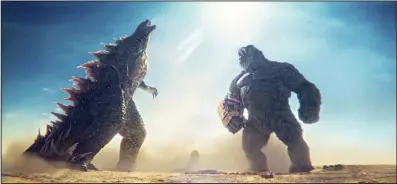  ?? (AP/Warner Bros. Pictures) ?? Godzilla (left) and Kong battle it out in a scene from "Godzilla x Kong: The New Empire," which kept its No. 1 standing for a second week with $31.7 million at the box office.