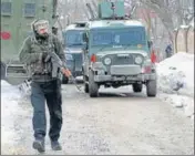  ?? ANI ?? An army jawan near the encounter site in Shopian on Monday.