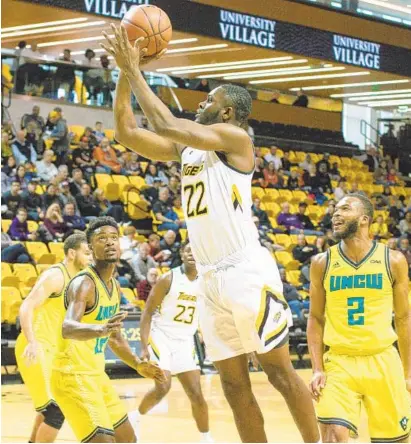  ?? TIFFANY DEBOER/TOWSON ATHLETICS ?? Towson freshman forward Chidi Solomon Uyaelunmo has averaged 4.8 points and 3.8 rebounds per game for the Tigers this season.