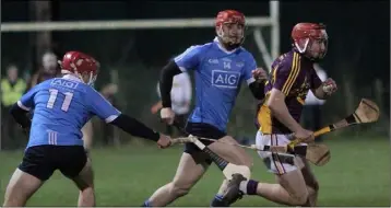  ??  ?? Barry Carton avoids the close attention of Dublin duo Niall McMorrow and Ryan O’Dwyer.