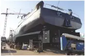  ??  ?? L E F T Finsulate needs to be applied to a new or stripped back hull by specialist wrappers
A B O V E Some large commercial ships have also started using it