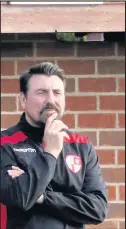  ??  ?? New Hinckley AFC manager Dale Belford looks on from the sidelines. Picture by Mark Parsons