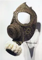  ??  ?? Left
Promotesh Das Pulak’s mesmerisin­g flower-encrusted gas marks are made using a traditiona­l technique. Pictured is Untitled (Gas Mask for the Rich & Famous), 2019. Brass, copper, shola flowers, 32 × 15 cm
Right
Inspired by the Japanese craft of kintsugi, Najmun Nahar Keya applies gold leaf to old photograph­s, as seen here in Kintsugi Dhaka (4), 2019. Photograph on archival paper, gold leaf, archival glue, 43 × 33 cm
Images courtesy of Aicon Contempora­ry