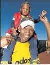  ?? Picture: EUGENE COETZEE ?? KHOSI FOR LIFE: Gcobani Budaza and his son Lulonwabo, 2, supported their favourite team at the MTN Super 8 final when Chiefs played Ajax at the Nelson Mandela Bay Stadium last Saturday