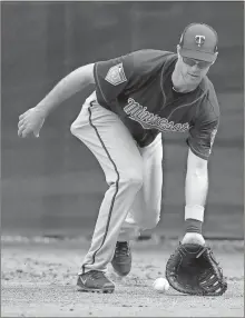  ?? John Minchillo / AP ?? Minnesota first baseman Joe Mauer, in his 17th major league spring training, hopes to continue to play for the Twins after his contract ends.