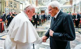  ?? ?? PAOLO VI PRIZE — This handout photo taken and released by Vatican Media, the Vatican press office, on May 29, 2023, shows Pope Francis (R) presenting Paolo VI Prize to Italian Republic President Sergio Mattarella at the Vatican. (Vatican Media/afp)