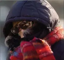  ?? BARRY GRAY, THE HAMILTON SPECTATOR ?? Hamiltonia­ns bundled against the cold Tuesday as Arctic air continues to blanket much of the country. While it reached -7, the wind made it feel much colder. Expect more of the same Wednesday with a high of -8.