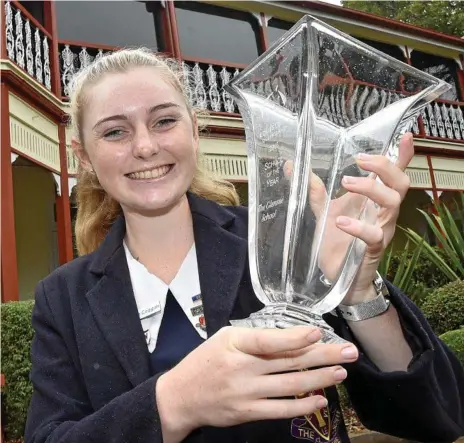  ?? Photo: Bev Lacey ?? TOP TEAM: The Glennie School equestrian team captain Sarah-Jane Coggan celebrates the school being named Equestrian Queensland School of the Year.