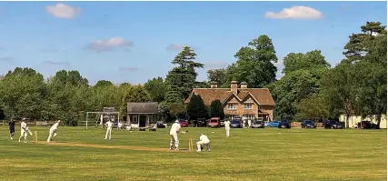  ?? ?? The picturesqu­e Badminton cricket ground