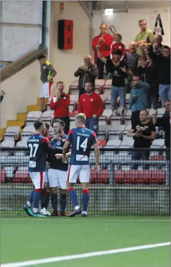  ??  ?? Lewis Morrison, Lee Lynch, David Cawley and Kris Twardek celebrate Rovers’ equalising goal. Pic: John Paul McGinley Photograph­y.