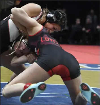  ?? KATHRYN SCOTT — SPECIAL TO THE DENVER POST ?? Chatfield’s Janessa George ( top) beats Loveland’s Morgan Johnson in the CHSAA state wrestling tournament at Ball Arena on Saturday.