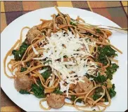  ?? LINDA GASSENHEIM­ER/TNS ?? Spaghetti with Sausage and Kale.