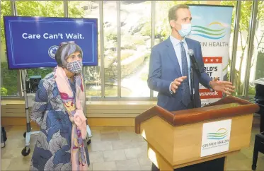  ?? Ned Gerard / Hearst Connecticu­t Media ?? President and CEO Patrick Charmel speaks Tuesday at Griffin Hospital’s Center for Cancer Care in Derby. With Charmel is U.S. Rep. Rosa DeLauro, D-3.
