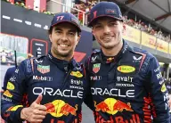  ?? ?? THUMBS-UP
Verstappen had his crew celebratin­g this spring in Bahrain, while Pérez (near left) came out on top as they finished 1–2 in Azerbaijan.