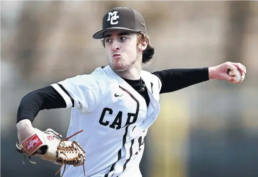  ?? BRIAN O’MAHONEY/DAILY SOUTHTOWN ?? Mount Carmel’s Shane Curtin delivers a pitch against Richards during the fourth inning of an April 16 game.