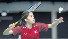  ??  ?? Badminton star Phittayapo­rn Chaiwan competes in the bronze medal match.