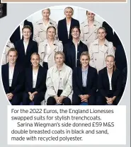  ?? ?? For the 2022 Euros, the England Lionesses swapped suits for stylish trenchcoat­s.
Sarina Wiegman’s side donned £59 M&S double breasted coats in black and sand, made with recycled polyester.