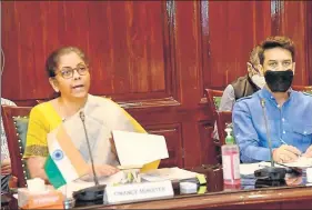  ?? PTI ?? ■
Union finance minister Nirmala Sitharaman (left) with minister of state for finance Anurag Thakur at the 22nd FSDC meeting held through video conference in New Delhi.