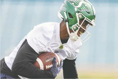  ?? MICHELLE BERG ?? Roughrider­s receiver Jester Weah runs through his paces at training camp on Friday. Murray Mccormick says he's one to watch.