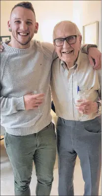  ?? SUBMITTED PHOTO VIA CP ?? Paul Russell stands with his personal trainer, Dane Woodland, at Russell’s 94th birthday party.