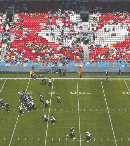  ?? MARK BLINCH/THE CANADIAN PRESS ?? Although some teams are profitable, other CFL clubs such as the Toronto Argos play in front of many empty seats.