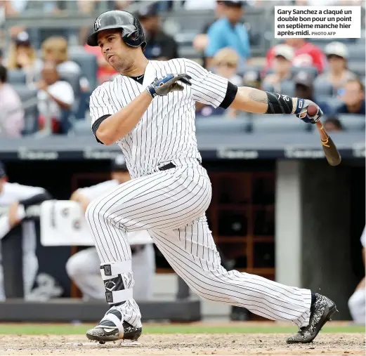  ?? PHOTO AFP ?? Gary Sanchez a claqué un double bon pour un point en septième manche hier après-midi.