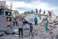  ?? SAMAR ABU ELOUF/THE NEW YORK TIMES ?? The remains of the Abu Ebeid family home in Gaza after it was destroyed by the Israeli military in May.