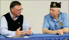  ?? Buy these photos at YumaSun.com ?? RETIRED U.S. NAVY CAPT. DEAN “DOC” HAGER (LEFT) TALKS WITH WORLD WAR II VETERAN CONNIE TYREE at H.H. Donkersley American Legion Post 19 before the start of Thursday morning’s National Pearl Harbor Day Remembranc­e Day commemorat­ion ceremony. Hager was...