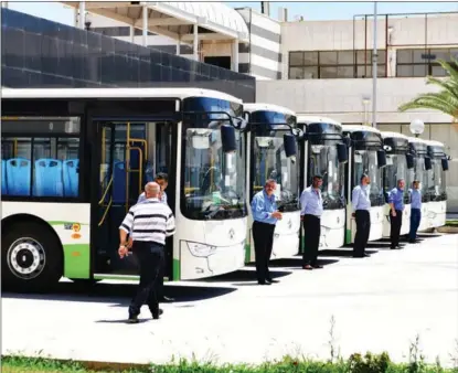  ?? XINHUA ?? Buses donated by China are ready for service in Damascus, Syria, on June 29.