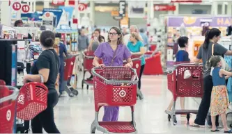  ?? LM OTERO THE ASSOCIATED PRESS ?? Target has sharpened its pricing strategy, redesigned stores, introduced exclusive products and updated its supply chain.