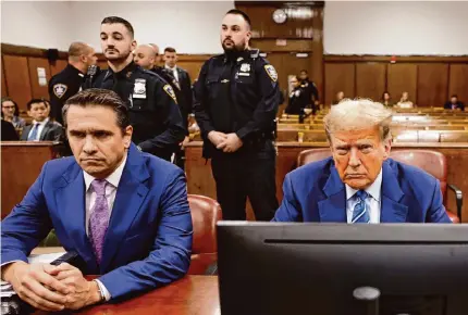  ?? Michael M. Santiago/Getty Images ?? Donald Trump sits with his attorney Todd Blanche during the second day of his criminal trial at Manhattan Criminal Court. Jury selection moved more quickly than expected Tuesday, and Trump later told reporters that the judge was “rushing” the trial.