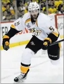  ?? Keith Srakocic ?? The Associated Press Nashville Predators wing Austin Watson is facing a charge of domestic assault for allegedly pushing his girlfriend on June 16 outside a gas station in Franklin, Tenn.
