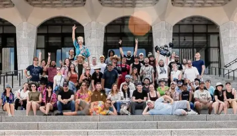  ?? Photo provided by Miles Joris-peyrafitte ?? The cast and crew of “The Good Mother” post for a group photo on the steps of the State Museum after they wrapped filming in June 2022