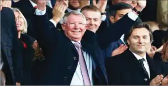  ??  ?? Ferguson acknowledg­ing cheers at Old Trafford yesterday