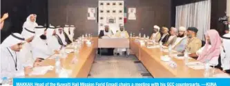  ?? —KUNA ?? MAKKAH: Head of the Kuwaiti Hajj Mission Farid Emadi chairs a meeting with his GCC counterpar­ts.