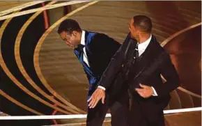  ?? PIC AFP ?? Actor Will Smith slapping fellow actor and comedian Chris Rock onstage during the 94th Oscars in Hollywood, California, recently.