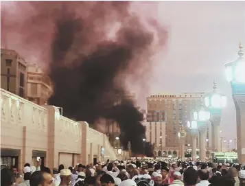  ?? Ap photo ?? HOLY SITE: A suicide bombing outside a mosque in Medina, Saudi Arabia, yesterday, plus attacks in two other Saudi cities, raises fears of an attempt to destabiliz­e the country.