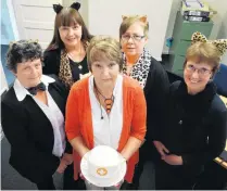  ?? PHOTO: DANIEL BIRCHFIELD ?? Final fling . . . Norma McLeod (centre) surrounded by her colleagues on her last day of work at the Oamaru division of Healthcare NZ on Wednesday. Farewellin­g her are (from left) Cherie Fridd, Susan Dawson, Fred Lewthwaite and Jo Cunningham.