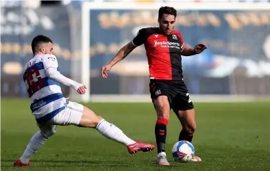  ??  ?? City’s Matty James (right) and Queens Park Rangers’ Ilias Chair battle for the ball