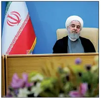  ?? AP/Iranian Presidency Office ?? Iranian President Hassan Rouhani attends a meeting of Health Ministry officials Tuesday in Tehran. In a televised address, Rouhani called new U.S. sanctions “outrageous and idiotic,” adding that the White House is afflicted by mental handicap and does not know what to do.