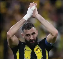  ?? AP ?? Karim Benzema applauds Al Ittihad’s supporters after their Club World Cup win over Auckland at King Abdullah Sports City